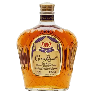 Bottle of Crown Royal Fine De Luxe Blended Canadian Whisky with a golden amber liquid and signature diamond-cut design.