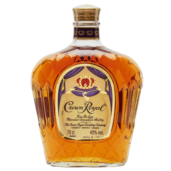 Bottle of Crown Royal Fine De Luxe Blended Canadian Whisky with a golden amber liquid and signature diamond-cut design.